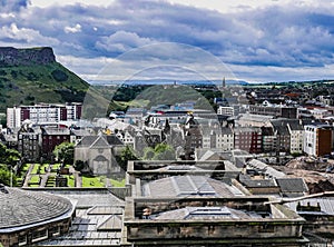 View of the Rooftops of Edinburgh with Salisbury Crags in the Background