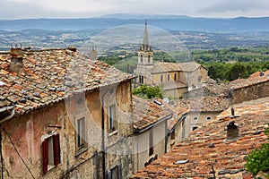 View on rooftops and Luberon valley in Bonnieux, Provence France