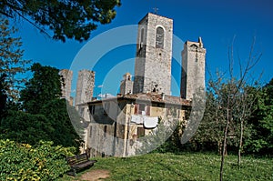 View of rooftops and towers with garden at San Gimignano.