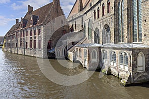View of Rosary Quay (Rozenhoedkaai) by the water channel Dijver Canal, Bruges, Belgium