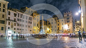View of Rotonda square and Fountain timelapse near Pantheon at night light. Rome, Italy photo
