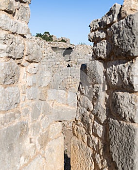 View of the round tower through the loophole of the middle tower of the western wall of Nimrod Fortress located in Upper Galilee