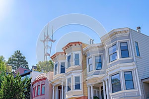 View of rowhouses and Sutro Tower from below at San Francisco, CA
