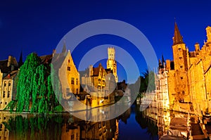 View from the Rozenhoedkaai of the Old Town of Bruges at dusk