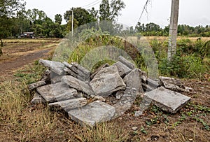 A view of the rubble of concrete blocks that were demolished from a road