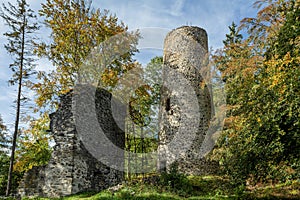 View of the ruined castle Volfstejn in autumn forest