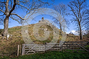 View of the ruins of Corfe Castle on top of Hill outside Corfe, Dorset, UK