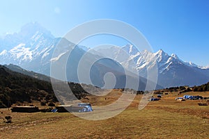 View of runway of Syangboche Airport near Namche Bazaar town with Himalaya mountains in the background