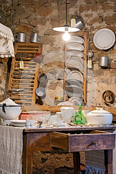 View of a rustic table with old kitchenware in a Catalan farmhouse