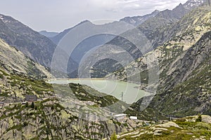View of RÃ¤terichsboden Lake at Grimsel Pass in Switzerland. It connects the Hasli valley in the Bernese Oberland with Goms in