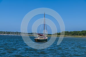 A view of a sail boat moored on the River Hamble