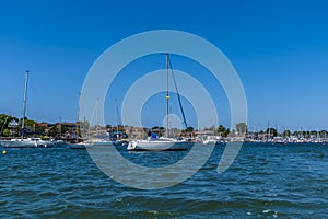 A view of sail boats moored on the River Hamble