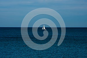 View of a sailboat in the Mediterranean sea photo