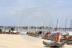View of sailboats docked at the pier viewed from University of Kiel Sailing Center