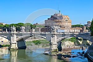 View on Saint Angel castle and bridge over the Tiber river in Rome, Italy photo