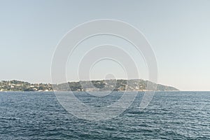 View of Saint Jean Cap Ferrat peninsula on the French Riviera from a boat