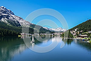 View of Saint Moritz lake with small boat