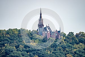 view on saint rochus chapel from hiking train to niederwald statue