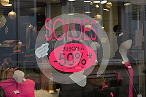 View of sales posters on shop windows