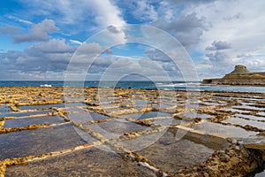 view of the salt pans in Xwejni Bay on the Maltese island of Gozo