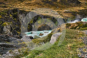 View of the Salto Grande waterfall in the Torres Del Paine park in cloudy weather. Chilean Patagonia in Autumn