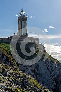 View of the San Juan de Nieva Lighthouse near Aviles in Asturias photo