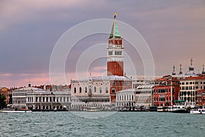 View of San Marco Campanile, Palazzo Ducale and Biblioteca at sunset in Venice, Italy