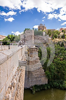 View of the San Martin Bridge crossing the Tagus to enter the old city of Toledo on the hill where you see the Old Cathedral