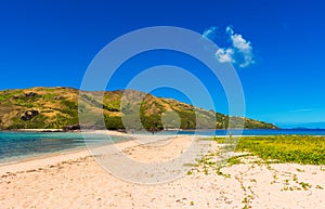 View of the sandy beach of the island, Fiji. Copy space for text