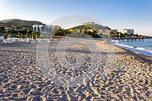 View of the sandy beach on a sunny morning. Turkey. Mahmutlar.Kargicak