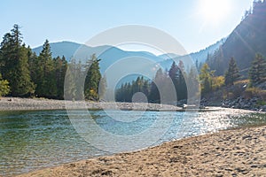 View of sandy beach and Similkameen River on a sunny day at Bromley Rock Provincial Park photo