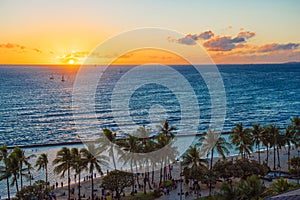 View of the sandy beach at sunset, Honolulu, Hawaii. Copy space for text