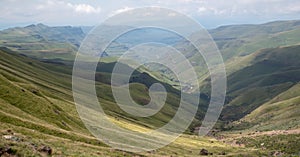 View of the Sani Pass, dirt rural road though the mountains which connects South Africa and Lesotho.