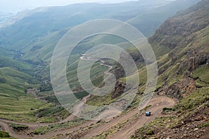 View of the Sani Pass, dirt rural road though the mountains which connects South Africa and Lesotho.