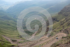 View of the Sani Pass, dirt rural road though the mountains which connects South Africa and Lesotho.