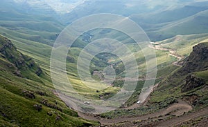 View of the Sani Pass, dirt rural road though the mountains which connects South Africa and Lesotho.