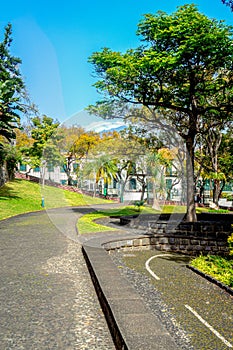View of Santa Catarina park - parque de Santa Catarina on sunny winter day with a part of Avenida do Infante