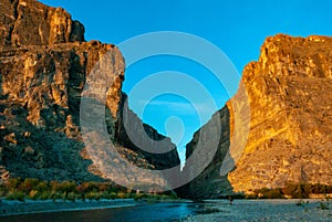A view of Santa Elena Canyon in Big Bend National Park. Cliffs rise steeply photo