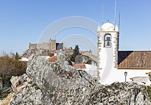 View of Santiago church and the ancient castle in MarvÃ£o town, Portalegre District, Portugal