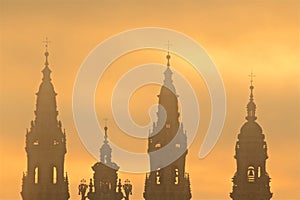 View of Santiago de Compostela Cathedral steeples at sunset in Santiago de Compostela, Spain photo