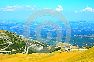 View from Sassotetto at mountainous landscapes and over the neighbouring lands