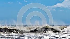 Waves at Playa Los Destiladeros located near Limon, Pedasi in Panama photo
