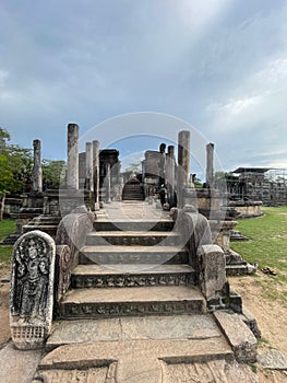 View of a scenic staircase leading to an ancient temple ruin in Polonnaruwa