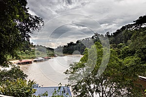 View of the scenic Sungai Tembeling river with floating restaurants at Taman Negara National Park, Pahang