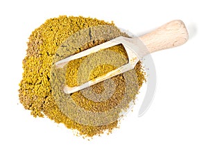 View of scoop on spice mix khmeli suneli on white