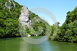 Mountain sculpted statue of Decebal near the Danube river in Rom