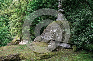 View of sculpture amidst the vegetation in the Park of Bomarzo.