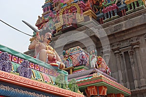 View of sculptures in a colorful gopuram