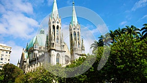 View of Se Cathedral between trees in Sao Paulo, Brazil