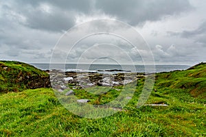 View of the sea and the coast with limestone rocks along the coastal walk route from Doolin to the Cliffs of Moher